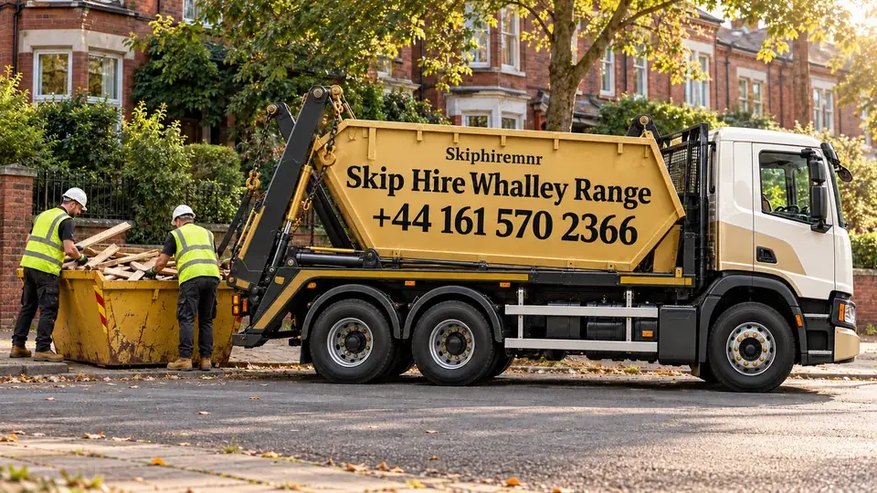 Illustrative Manchester Whalley Range scene with a gold and white truck branded Skip Hire Whalley Range, +44 161 570 2366, and workers loading a lowered skip.